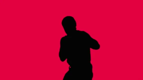 Working out boxer. A fight with a shadow. Stock Footage 88530440