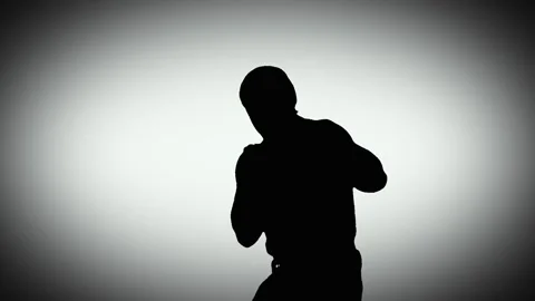 Working out boxer. A fight with a shadow. Stock Footage 88530986