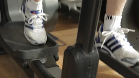 Working Out On The Elliptical At The Gym Stock Footage 102054724