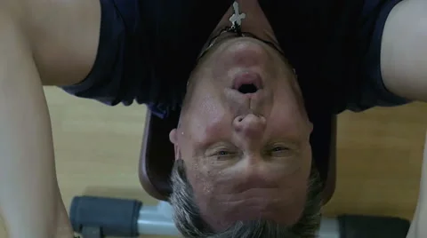 Working out hard with disk weight Video stock 52074096