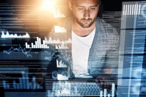 Working out the kinks. a young computer programmer working on source code. Stock Photos