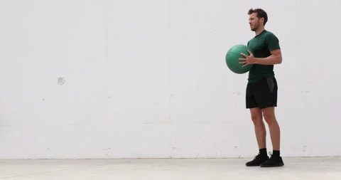 Working out man training legs and core ab workout doing lunge exercise with Stock Footage 135628951