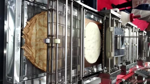 Working pancake frying machine Stock Footage 266687144