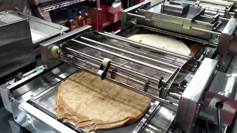 Working pancake frying machine Stock Footage 266687145