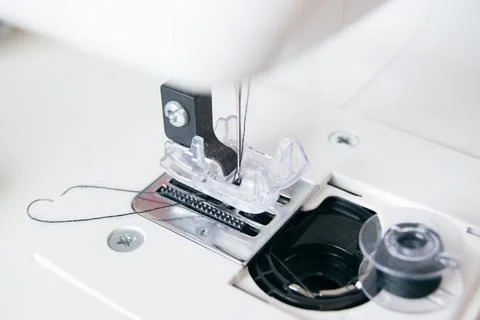 Working part of a home sewing machine for handicrafts. Selective focus on p.. Stock Photos