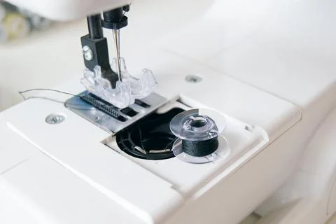 Working part of a home sewing machine for handicrafts. Selective focus on p.. Stock Photos