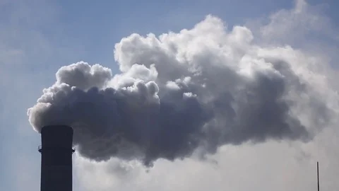 Working pipe in industrial factory from which smog comes out Stock Footage 74072660