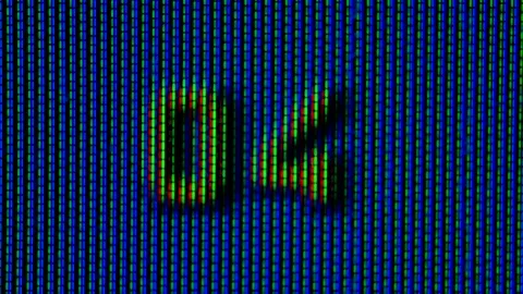 Working pixels in the screen color TV, with a video playback close up. On a blue Stock Footage 145913600