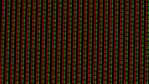 Working pixels in the screen color TV, with a video playback close up. Green and Stock Footage 145913861
