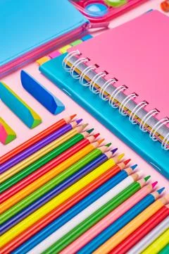 Working place elements for girls. Colored stationery Stock Photos