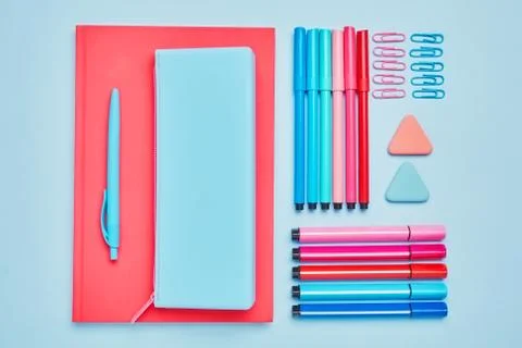 Working place elements. Stationery on a blue table 库存照片