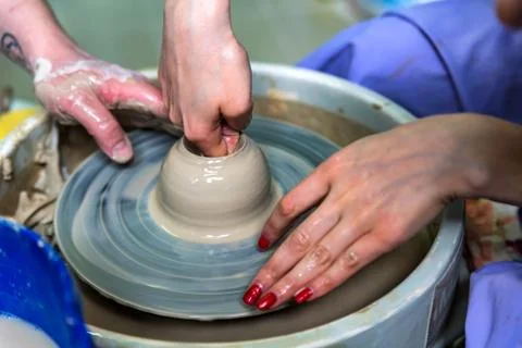 Working on potter's wheel close Stock Photos