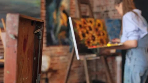 Working process in art studio. Set of painting brushes and palette. Painter Stock Footage 195995343