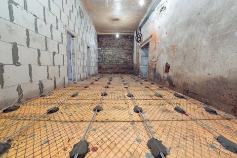 Working process of building house with wall made from foamed concrete blocks and Stock Photos