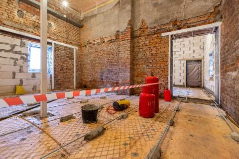 Working process of building house with wall made from foamed concrete blocks and Stock Photos