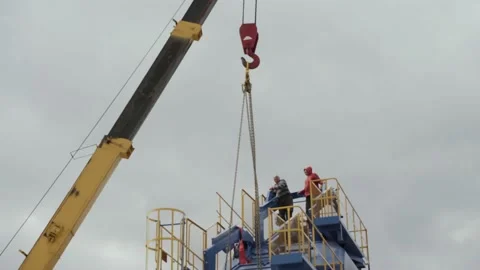 Working process on cement plant. A crane on concrete plant Video stock 171371673
