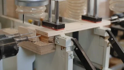 Working process of the CNC drilling machine in a furniture factory Stock Footage 242171738