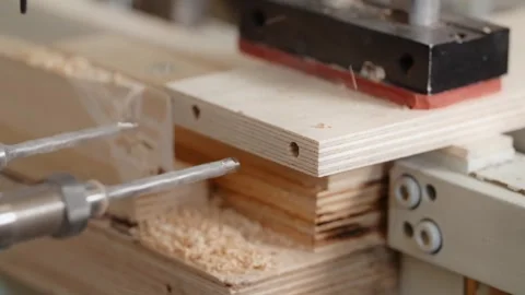 Working process of the CNC drilling machine in a furniture factory Stock Footage 242171838