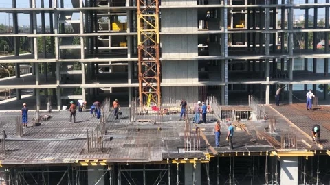 Working process at the construction site. Construction work. Builders at the Stock Footage 199094318