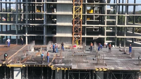 Working process at the construction site. Construction work. Builders at the Vídeos de archivo 201890215