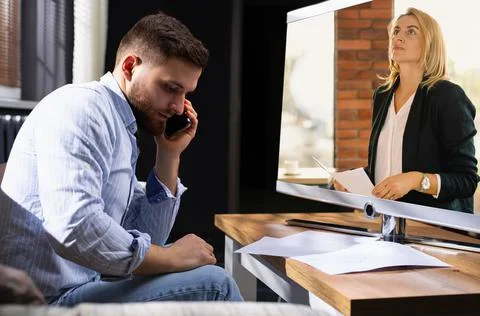 Working process. Financial manager is talking on phone, reporting on network Stock-Fotos