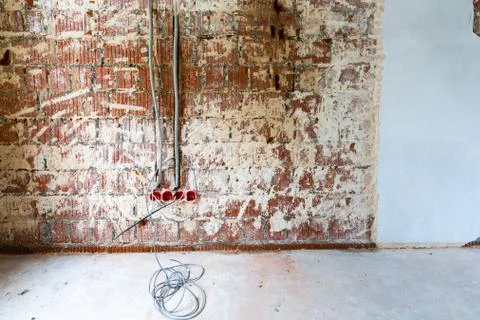 Working process to groove or wall chasing for electrical, internet cables and Stock Photos