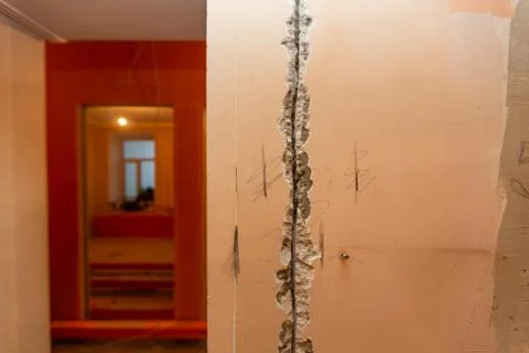 Working process to groove or wall chasing for electrical, internet cables and Stock Photos