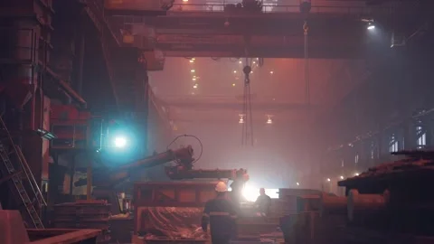 Working process in Industrial foundry metallurgical factory. Workers in large Stock Footage 153243755
