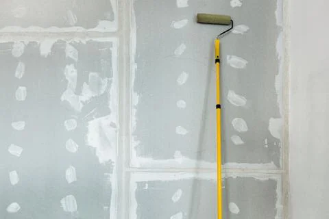 Working process of installing metal frames for plasterboard -drywall - for Stock Photos