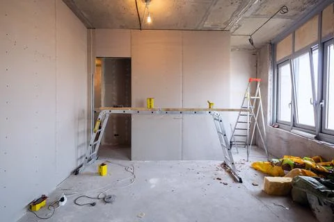 Working process of installing metal frames for plasterboard -drywall - for Stock Photos