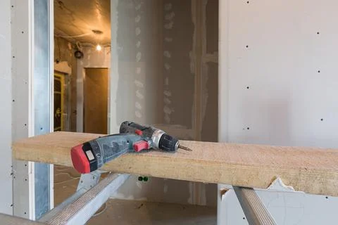 Working process of installing metal frames for plasterboard -drywall - for Stock Photos