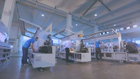 Working process in a machine tool factory. Machine assembly close-up. The worker Vidéo 242428180