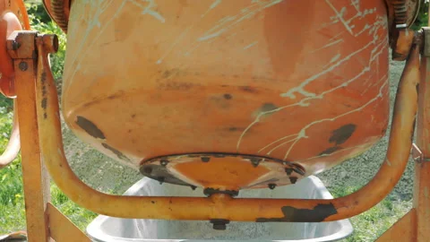 Working process of mixing concrete for the foundation of a private house, cement Stock Footage 332015158