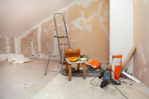 Working process of renovate room with installing drywall or gypsum plasterboard Stock-Fotos