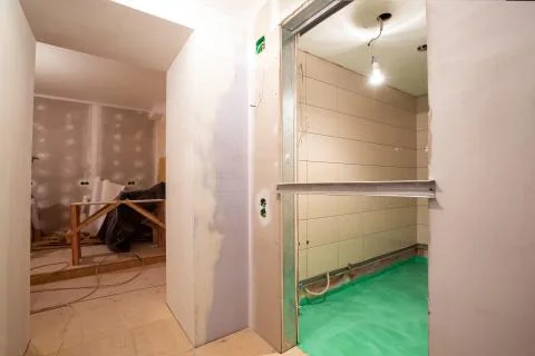 Working process of renovate room with installing drywall or gypsum plasterboard Stock Photos