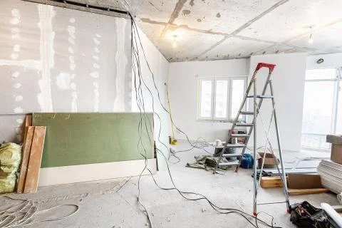 Working process of renovate room with installing drywall or gypsum plasterboard Stock Photos