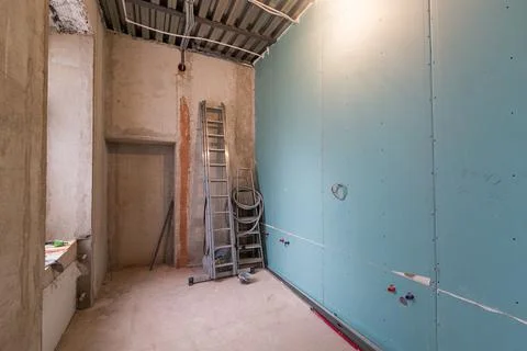Working process of renovate room with installing drywall or gypsum plasterboard Stock Photos