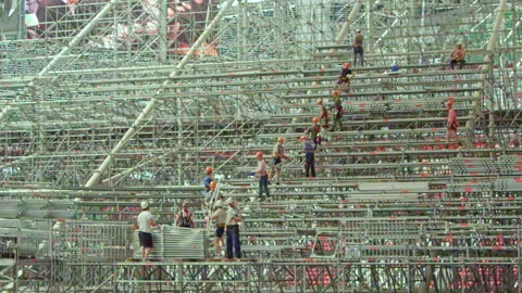 Working process at structure of tribune frame assembling Stock Footage 234320078