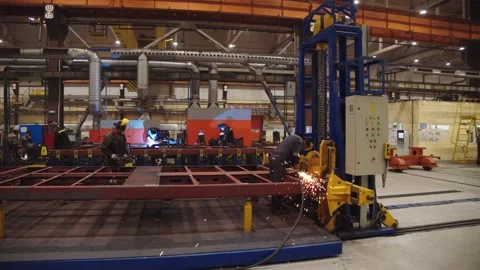 Working process at train car manufacturing plant. Factory workers in protective Stock Footage 202048963