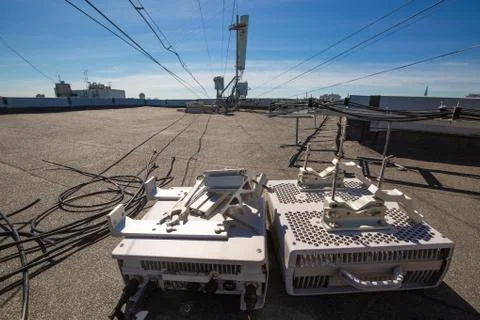 Working process of upgrading telecommunication equipment. Dismantled old Stock Photos