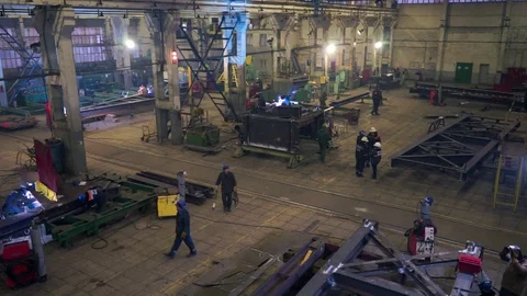 The working process in a warehouse with a metal. People work in their jobs. Stock Footage 122657960
