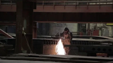 Working on the production and processing of metal in a large factory Stock Footage 73759227