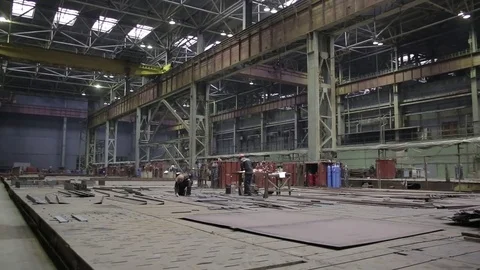 Working on the production and processing of metal in a large factory Stock Footage 73759430