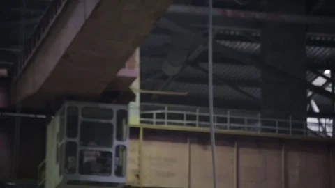 Working on the production and processing of metal in a large factory Stock Footage 73759589