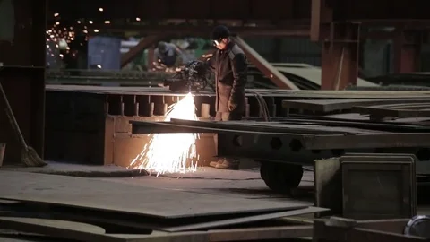 Working on the production and processing of metal in a large factory Stock Footage 73759612