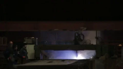 Working on the production and processing of metal in a large factory Stock Footage 73759618