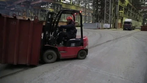 Working on the production and processing of metal in a large factory Stock Footage 73759651