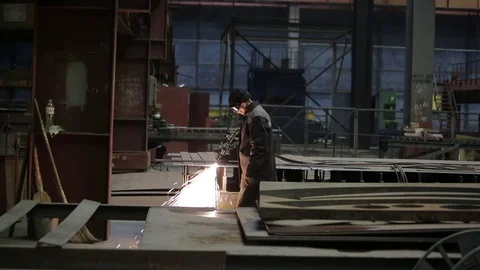 Working on the production and processing of metal in a large factory Stock Footage 73759676