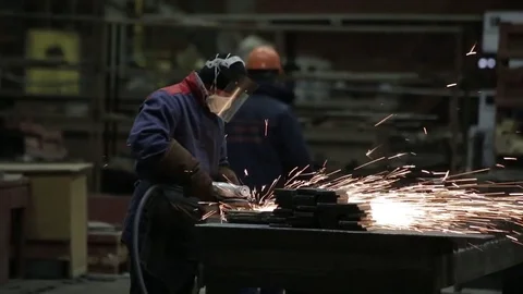 Working on the production and processing of metal in a large factory Stock Footage 73759826