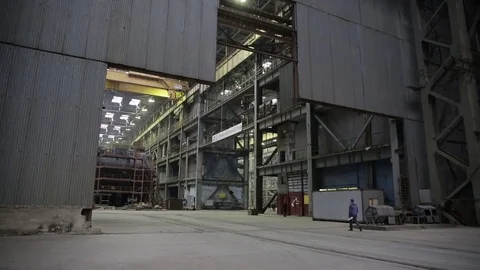 Working on the production and processing of metal in a large factory Stock Footage 73759833